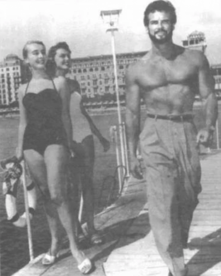 Steve Reeves Walking Outside Boardwalk